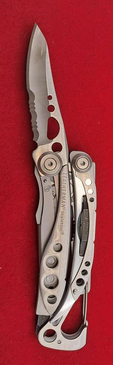 Leatherman Skeletool -Multi Tool In Tin Case -seem to be Unused