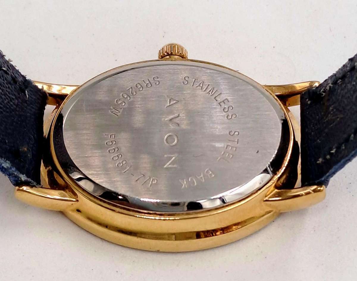 Pre-Owned Ladies AVON Quartz Watch -Working -missing a few decorative stones on the face