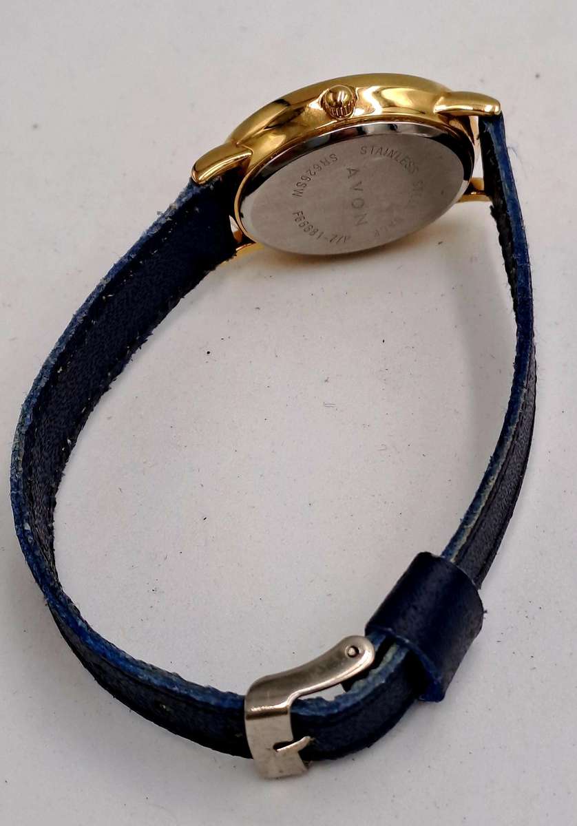 Pre-Owned Ladies AVON Quartz Watch -Working -missing a few decorative stones on the face