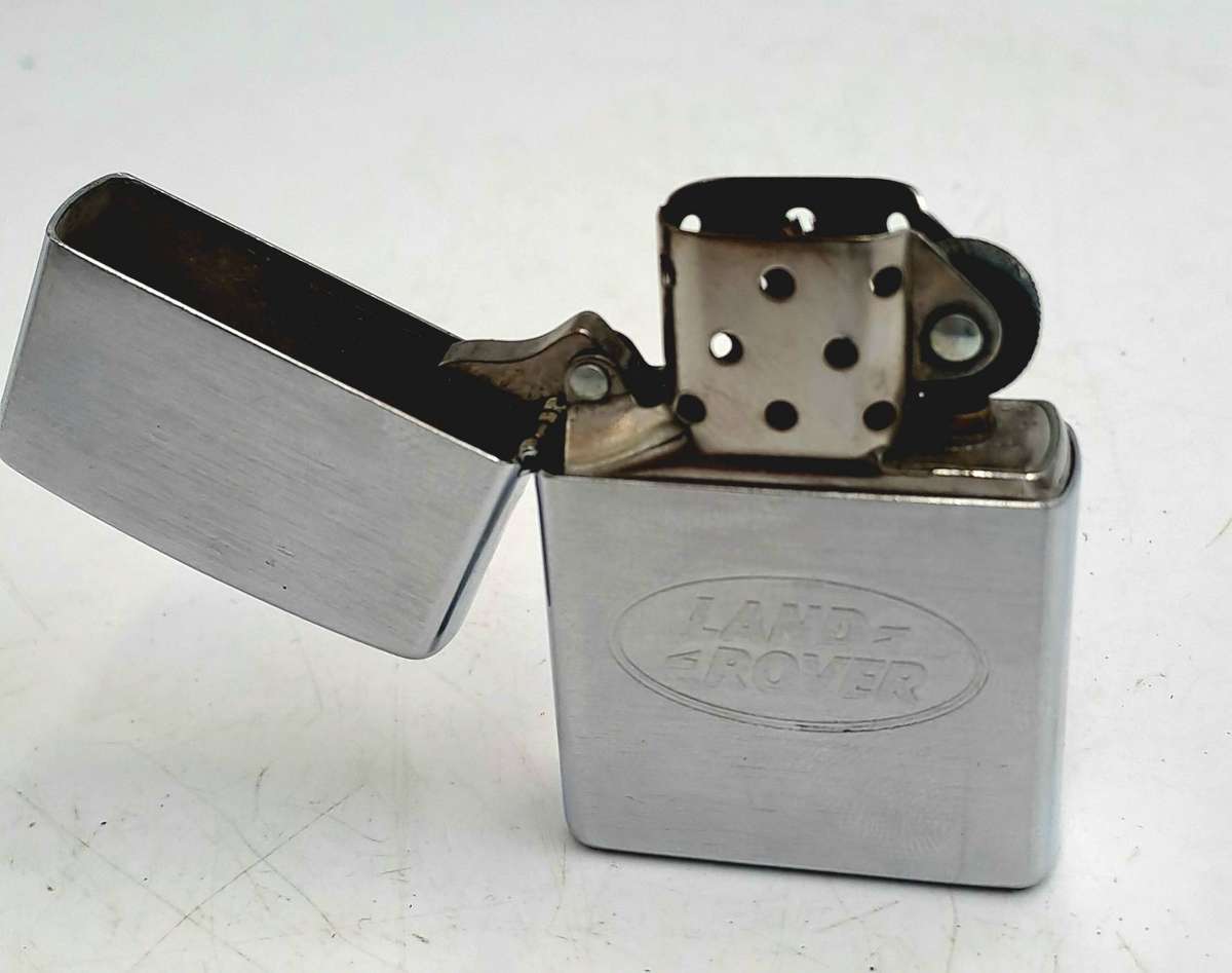 Vintage ZIPPO Lighter LANDROVER -great Spark need fluid Made in Bradford USA