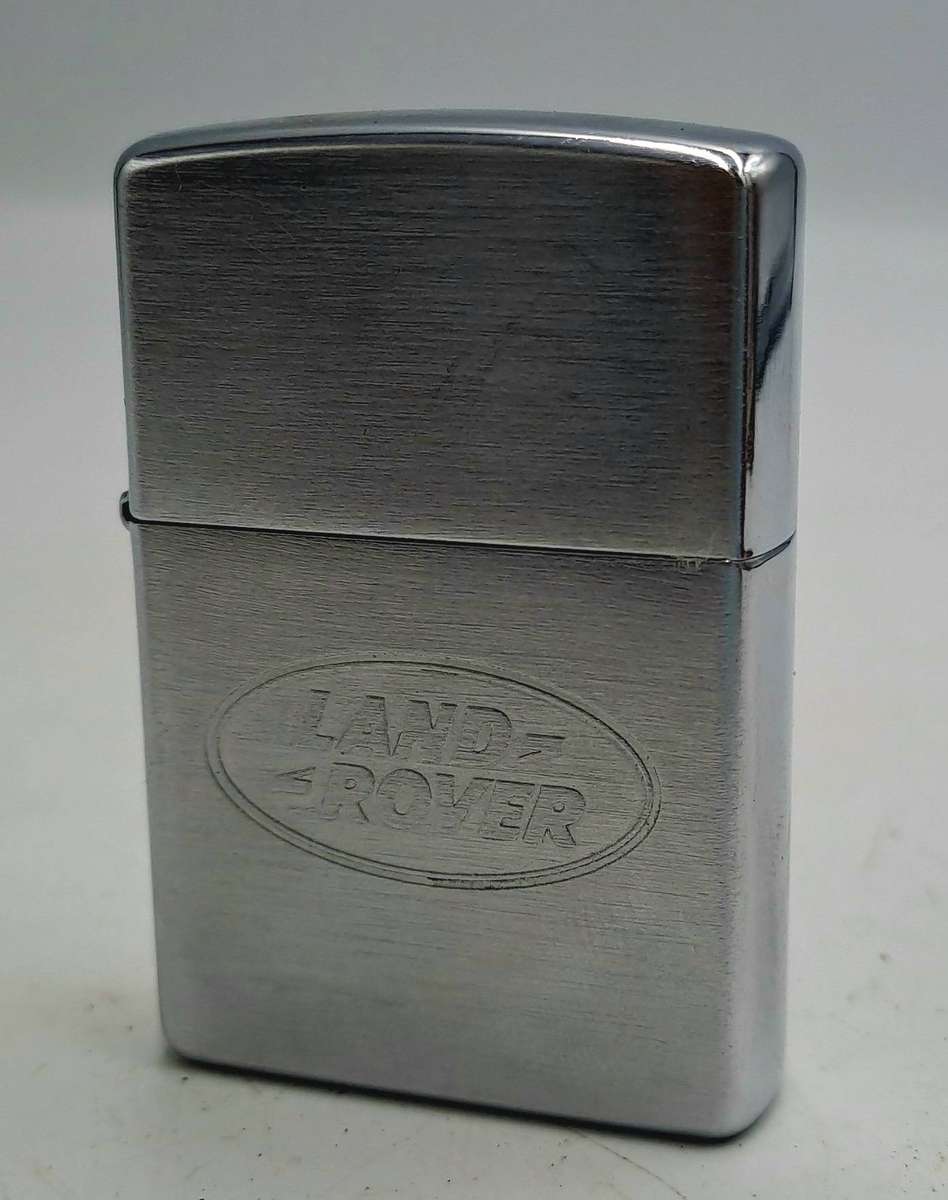Vintage ZIPPO Lighter LANDROVER -great Spark need fluid Made in Bradford USA