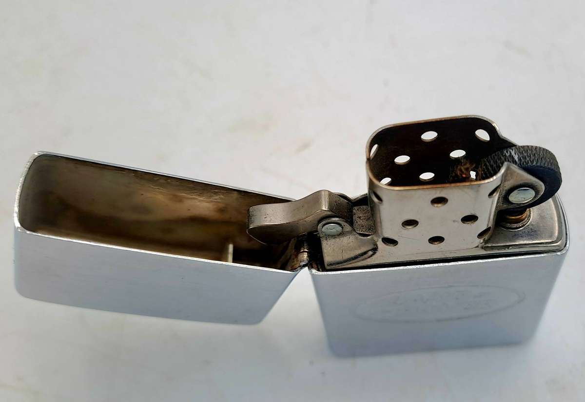 Vintage ZIPPO Lighter LANDROVER -great Spark need fluid Made in Bradford USA