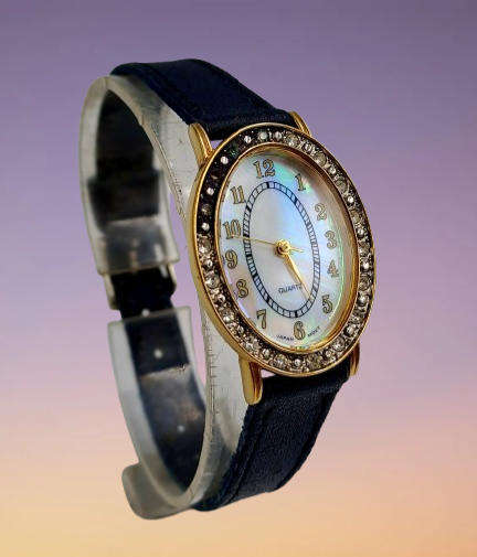 Pre-Owned Ladies AVON Quartz Watch -Working -missing a few decorative stones on the face