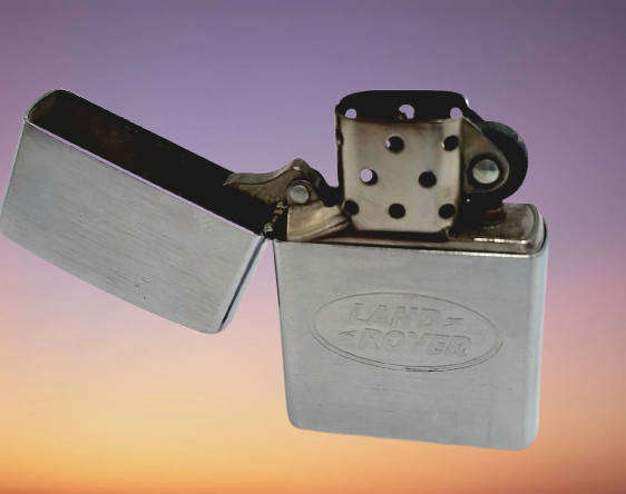 Vintage ZIPPO Lighter LANDROVER -great Spark need fluid Made in Bradford USA