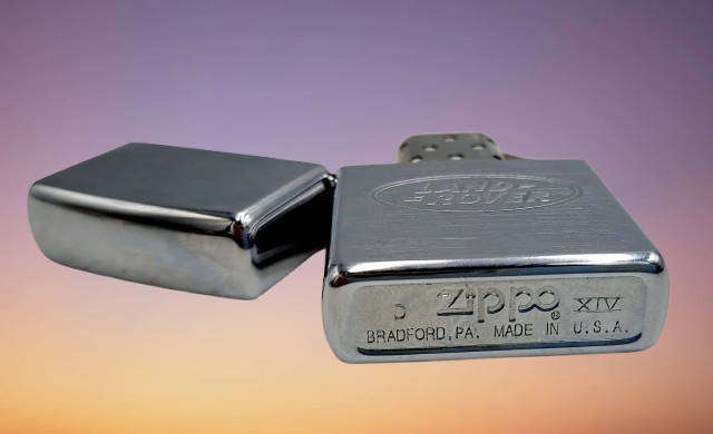 Vintage ZIPPO Lighter LANDROVER -great Spark need fluid Made in Bradford USA