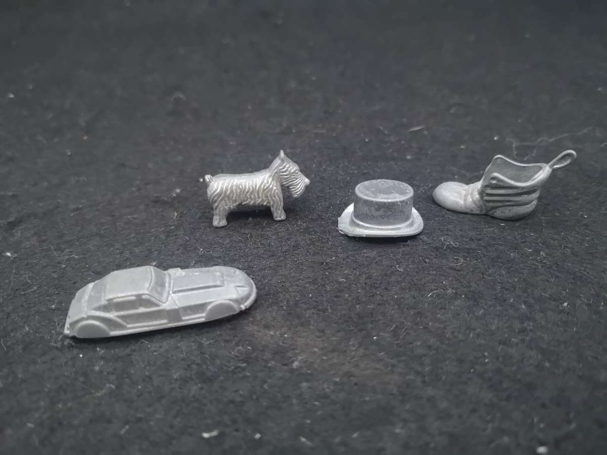 Metal Monopoly pieces
