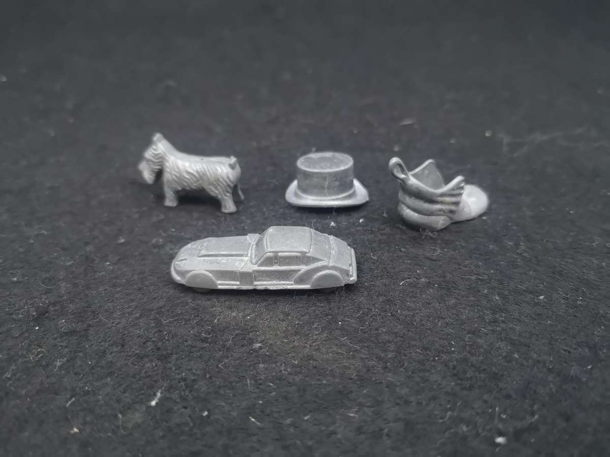 Metal Monopoly pieces