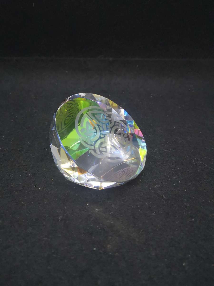 Pretty Celtic pattern glass paperweight