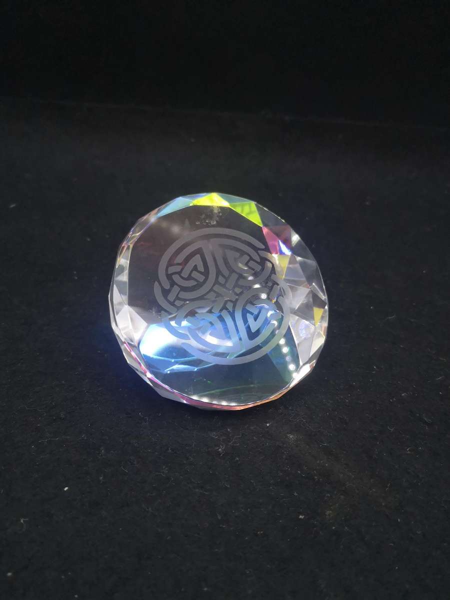 Pretty Celtic pattern glass paperweight