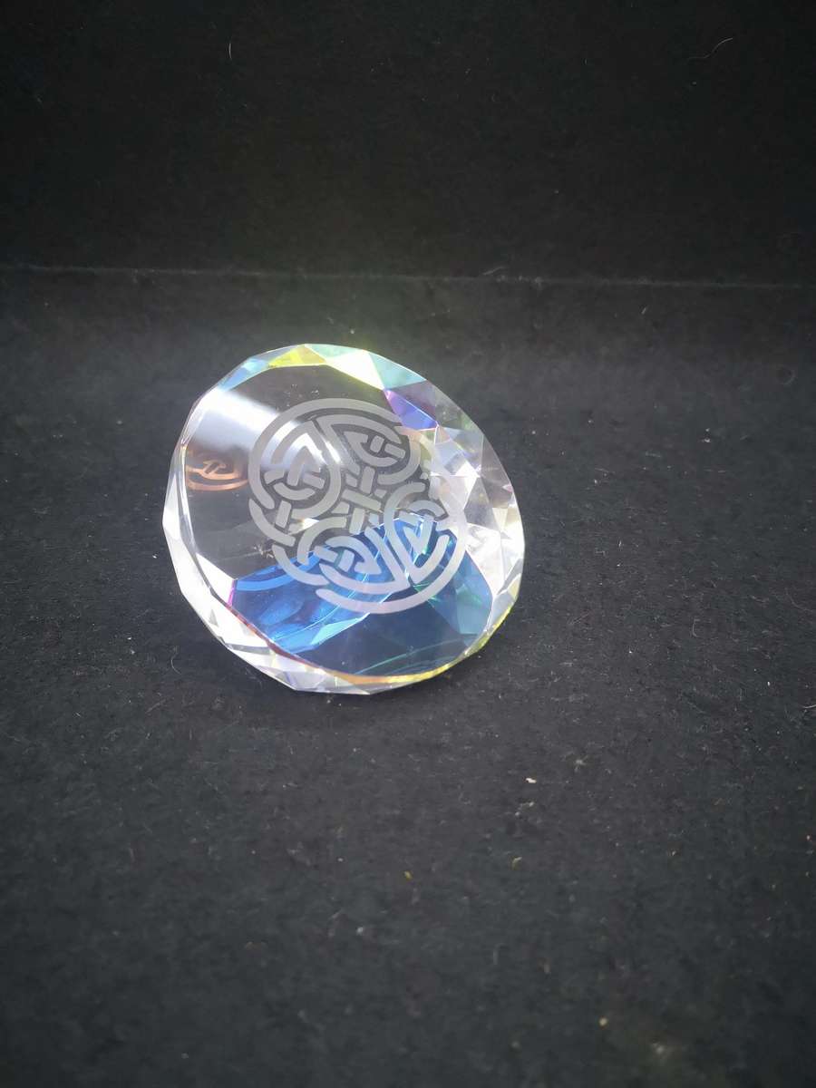 Pretty Celtic pattern glass paperweight
