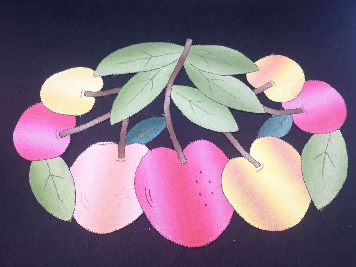 Set of ten handmade fabric cutout placemats