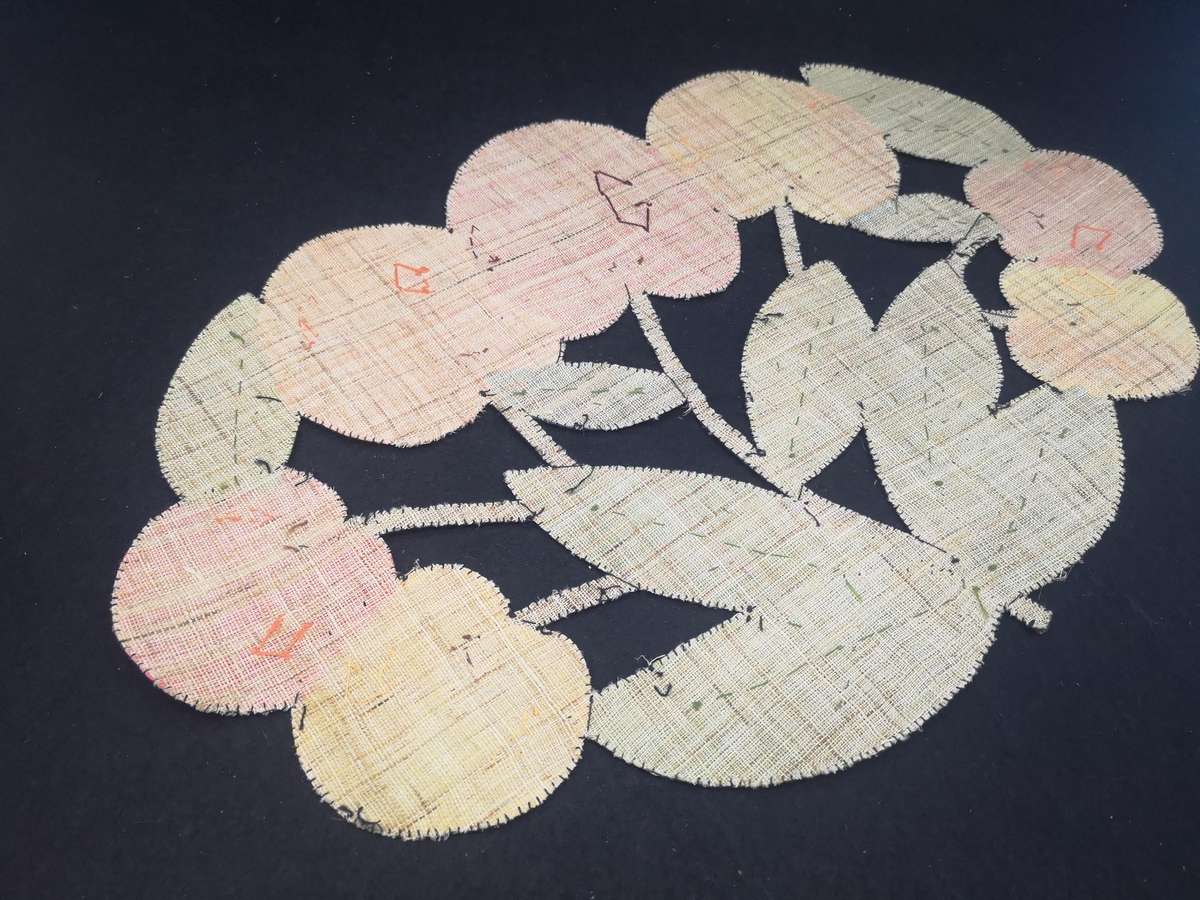 Set of ten handmade fabric cutout placemats