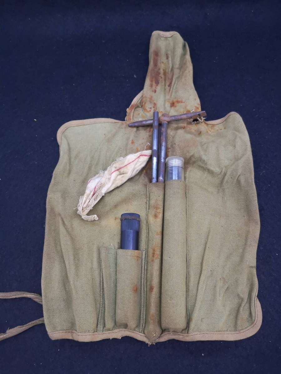 Old army rifle cleaning kit