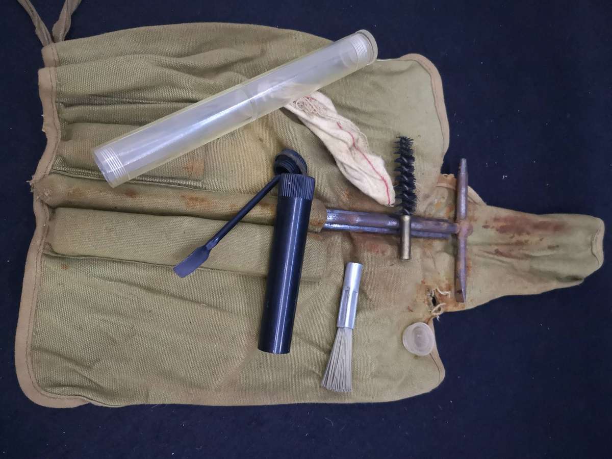 Old army rifle cleaning kit