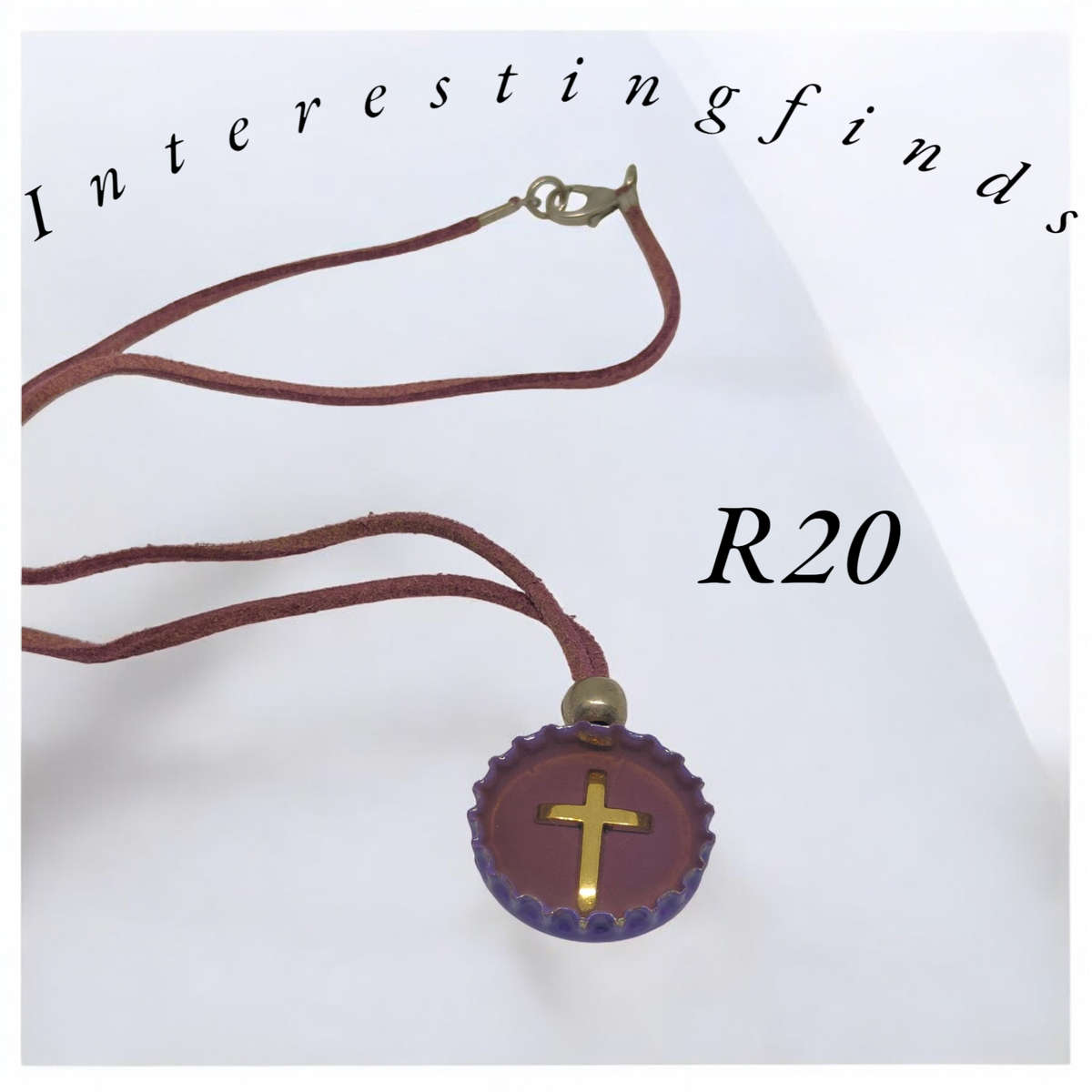 Interesting handmade necklace with cross detail pendant