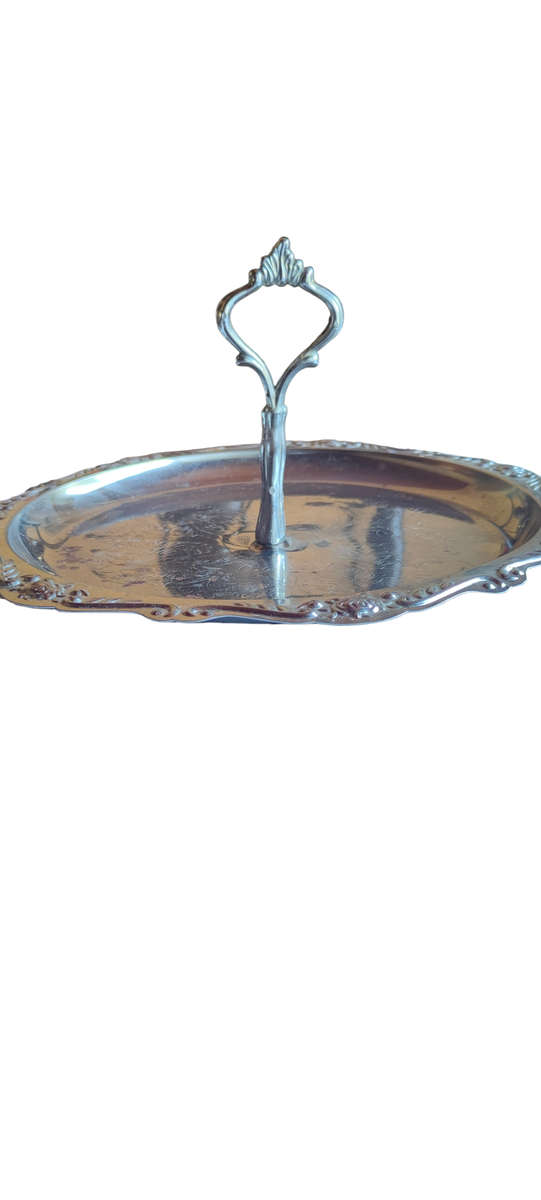 Vintage silver colored metal serving tray with handle