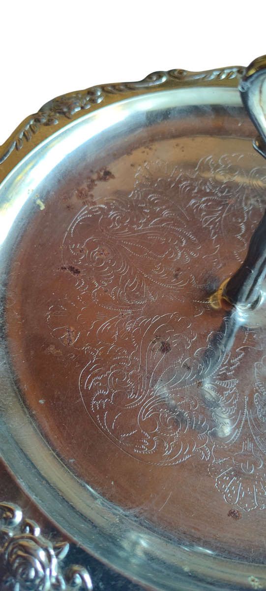 Vintage silver colored metal serving tray with handle