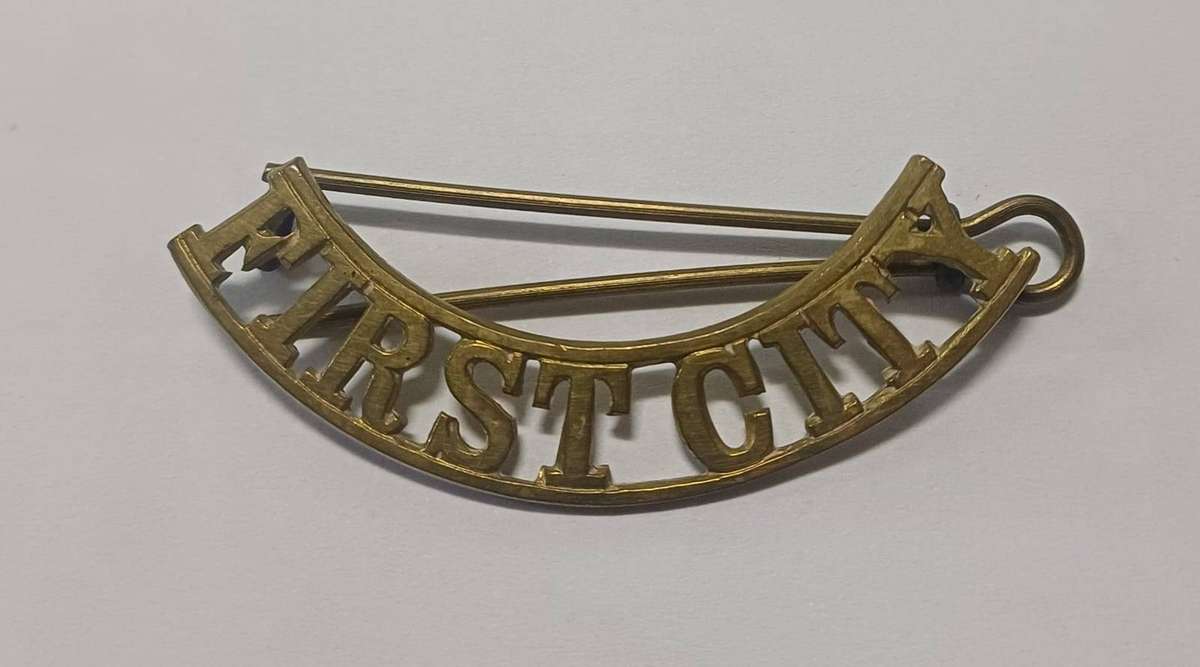 First City Badge, brass shoulder title worn from 1932