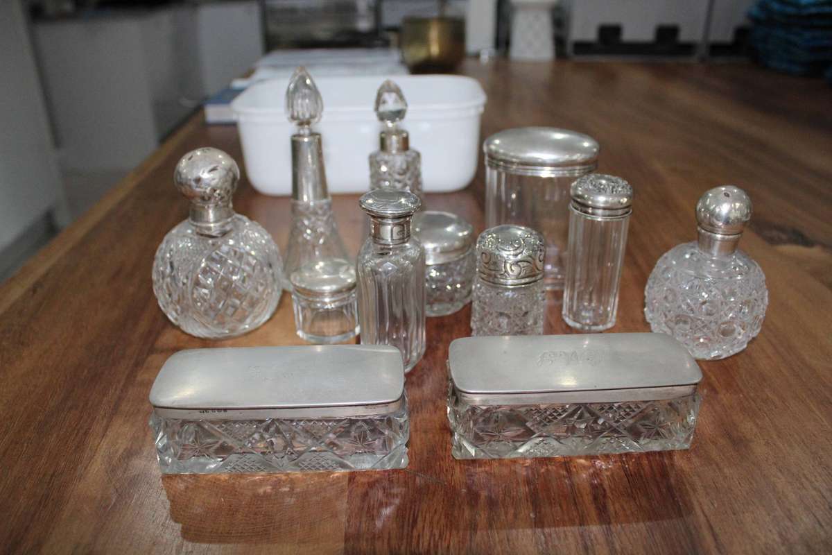 Sterling silver topped dressing table containers x 12!