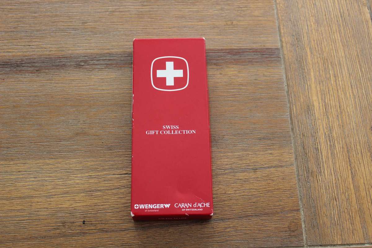 Swiss Army knife and pen set - unwanted gift.....bargain!