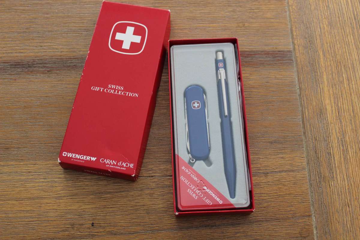 Swiss Army knife and pen set - unwanted gift.....bargain!