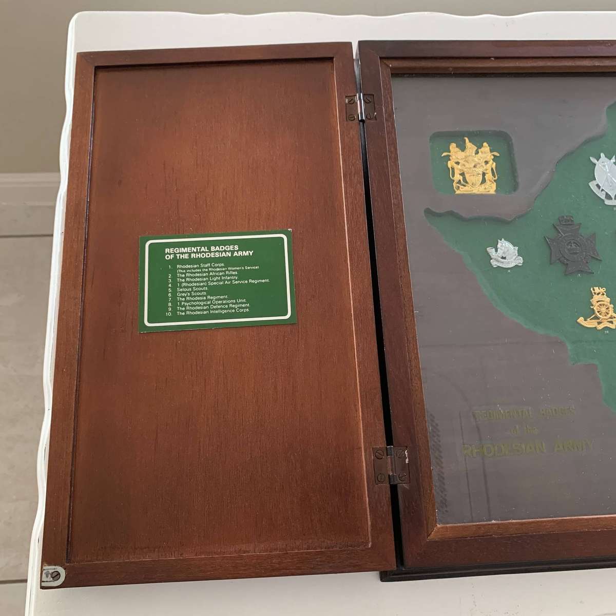 Display Cabinet of 'Rhodesian' Regimental Badges (Ltd Number)