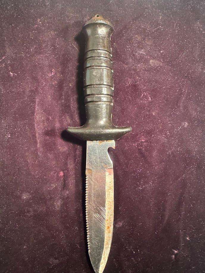 Vintage Nemrod Equipos diving knife with a serrated blade.  Made in Spain