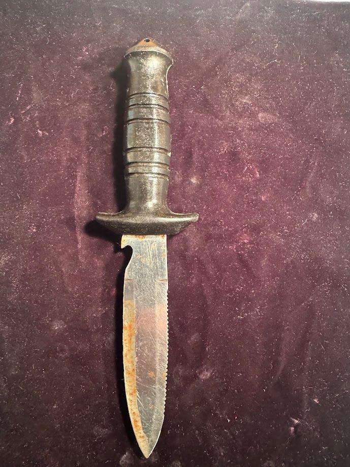Vintage Nemrod Equipos diving knife with a serrated blade.  Made in Spain