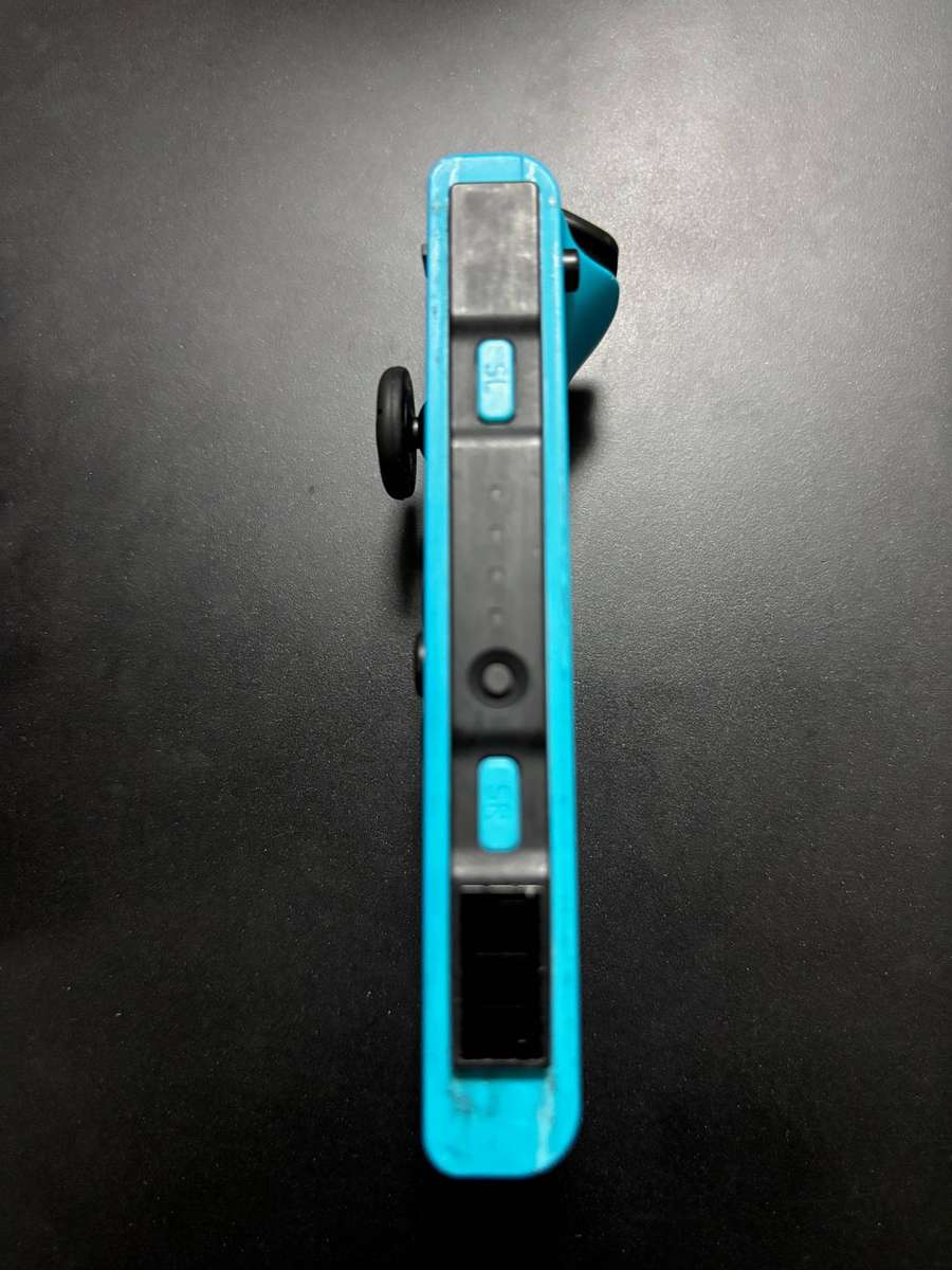 neon blue Left Joy-Con controller for Nintendo Switch with strap