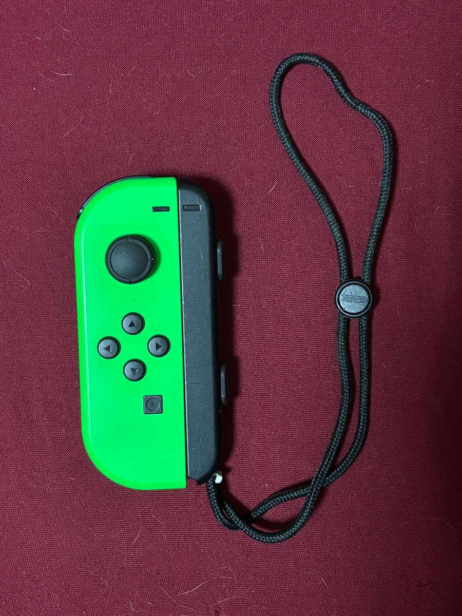 neon green Left Joy-Con controller for Nintendo Switch with strap