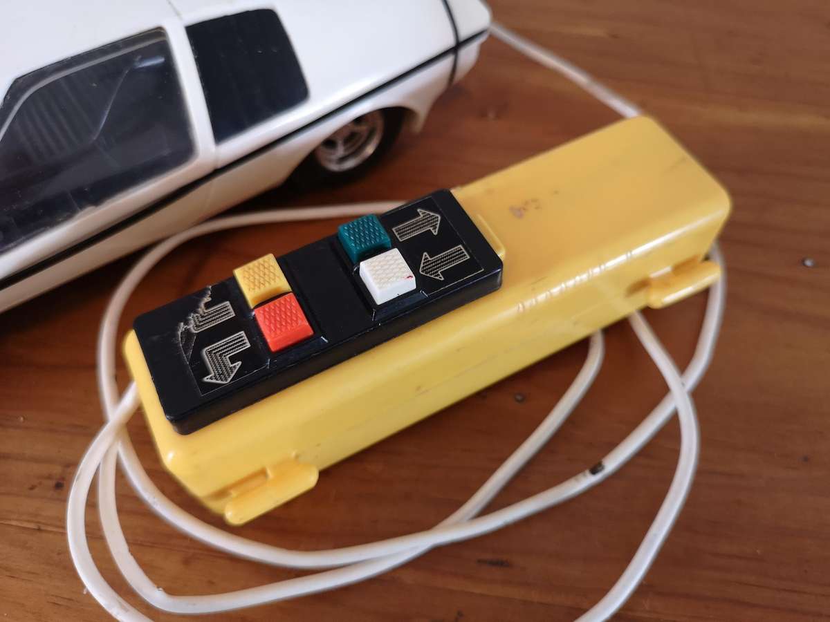 Vintage scale model BMW E25 Turbo remote control car