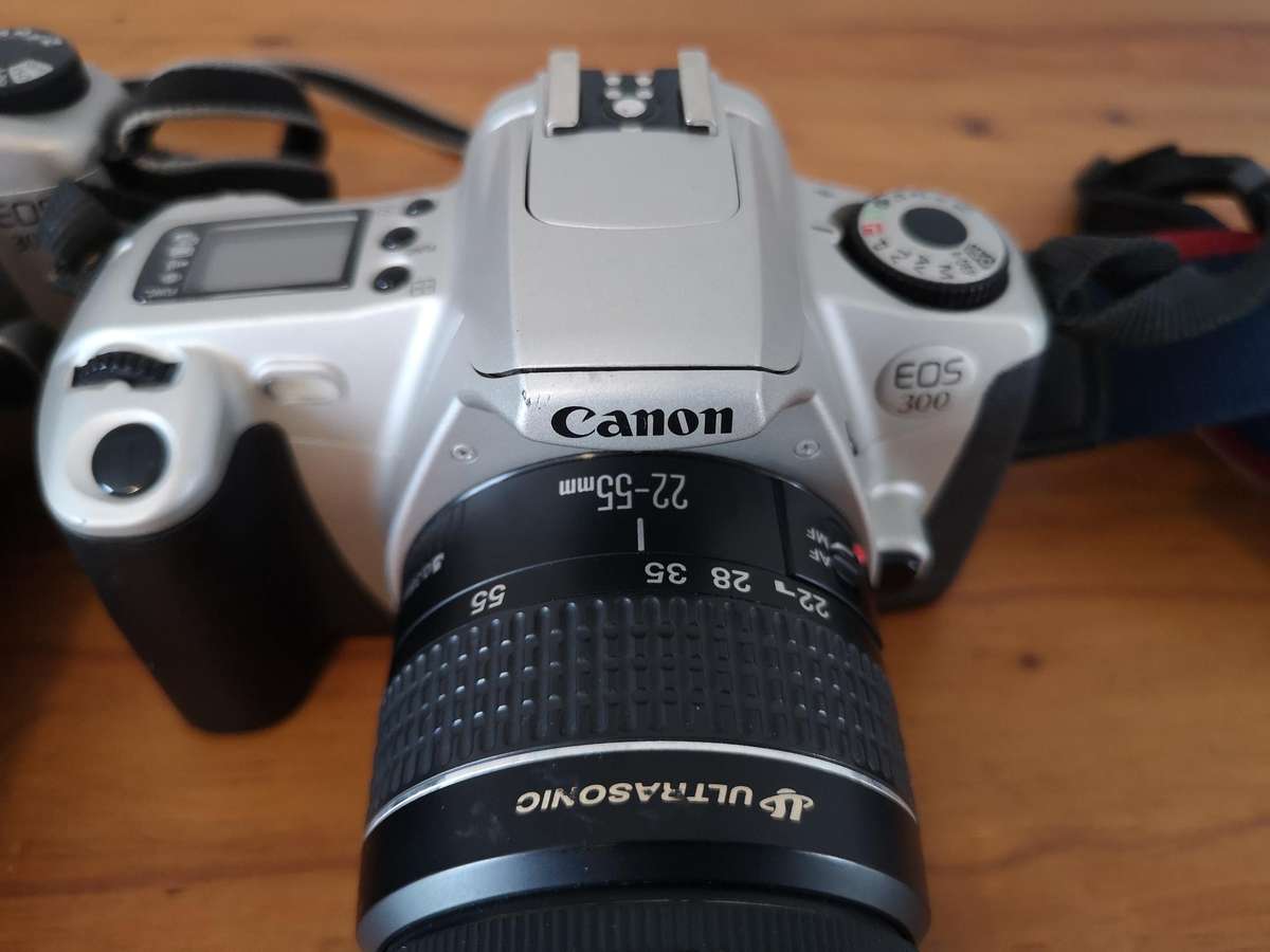 Two Canon EOS 35mm film cameras