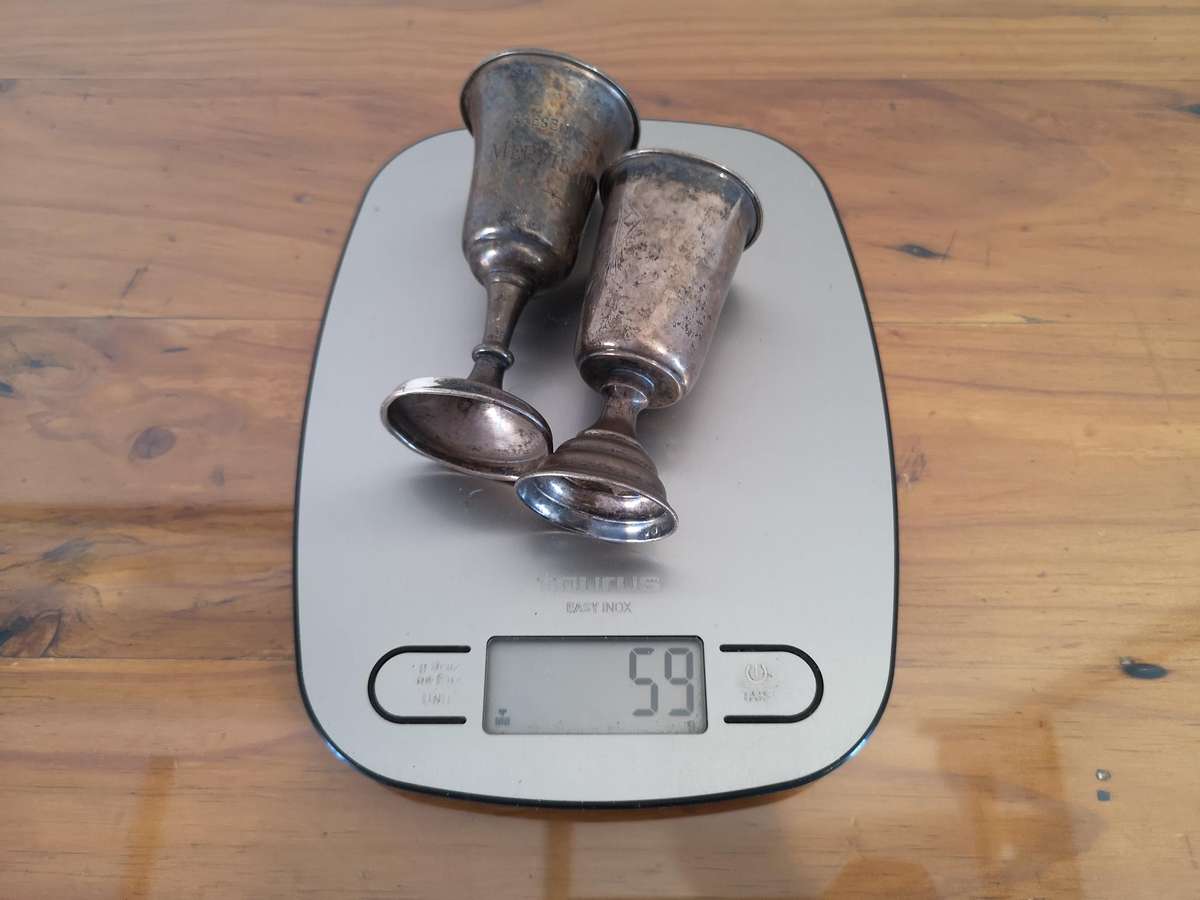 Two small old hallmarked sterling silver trophies