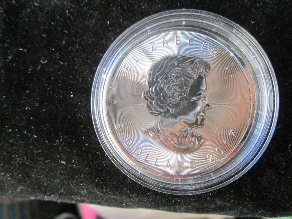 2017 Canada 1oz Silver Maple Leaf.  NB SLIGHT MILK SPOTS ON FRONT AND BACK.