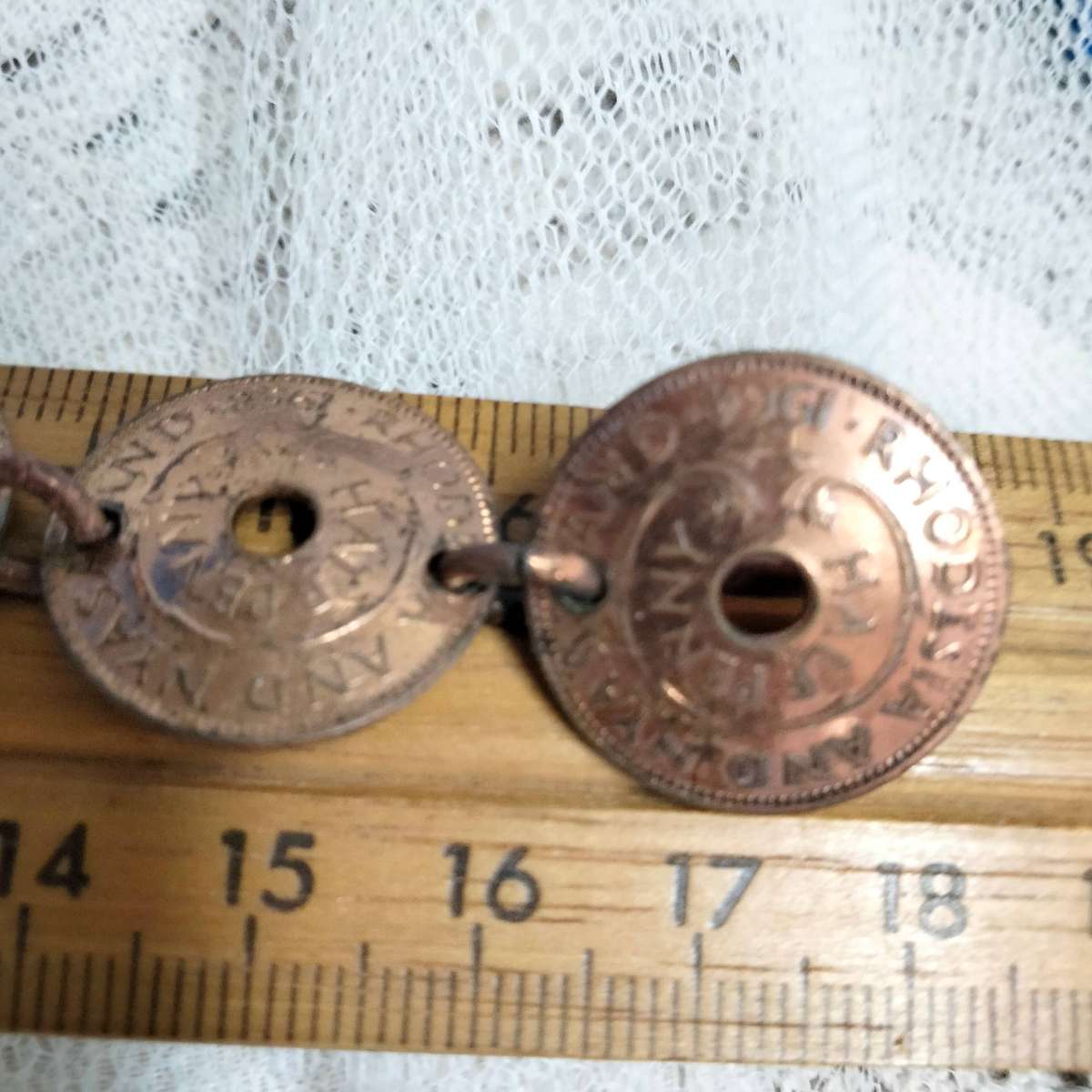 bracelet- Coins Rhodesia+Nyasaland half penny  link rings into holes LOOK At My BUY NOW NO WAITING