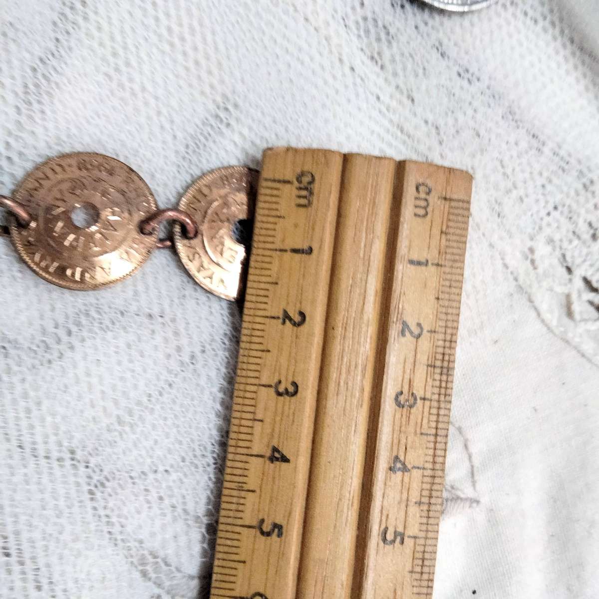 bracelet- Coins Rhodesia+Nyasaland half penny  link rings into holes LOOK At My BUY NOW NO WAITING