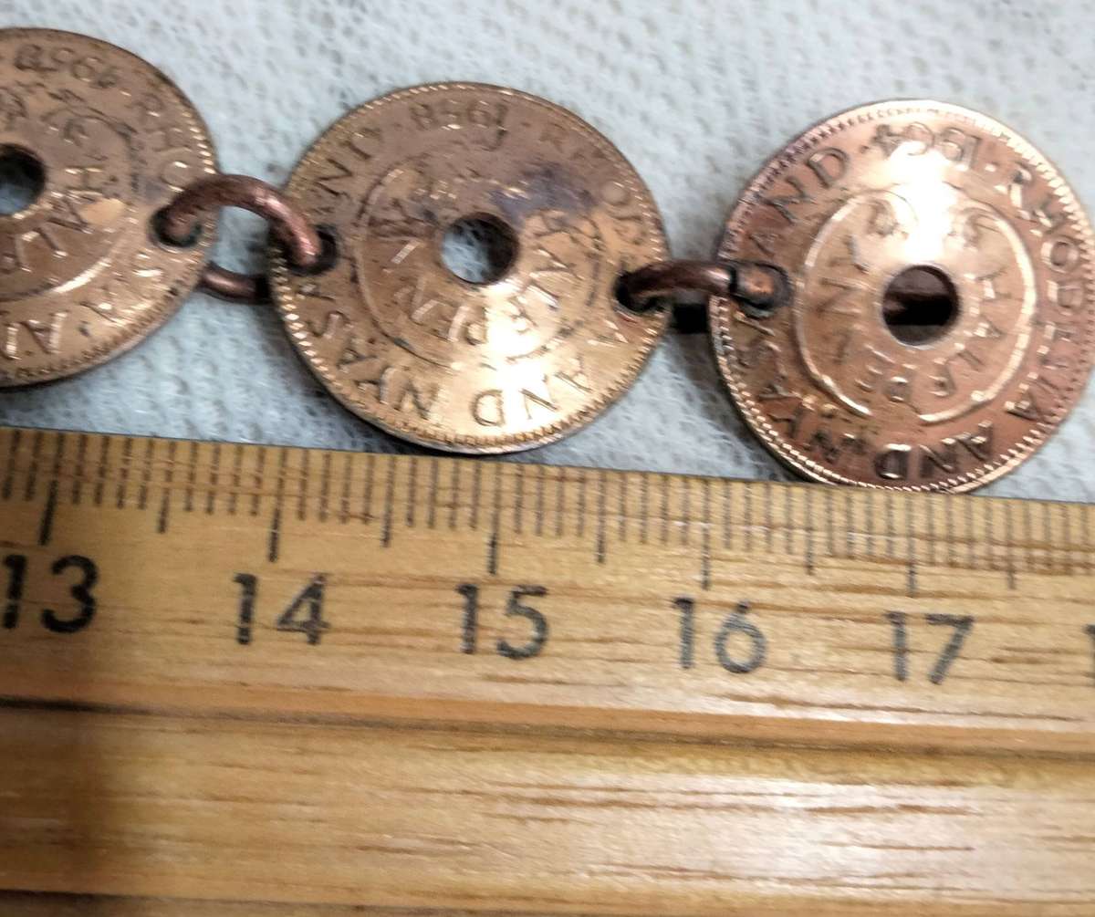 bracelet- Coins Rhodesia+Nyasaland half penny  link rings into holes LOOK At My BUY NOW NO WAITING