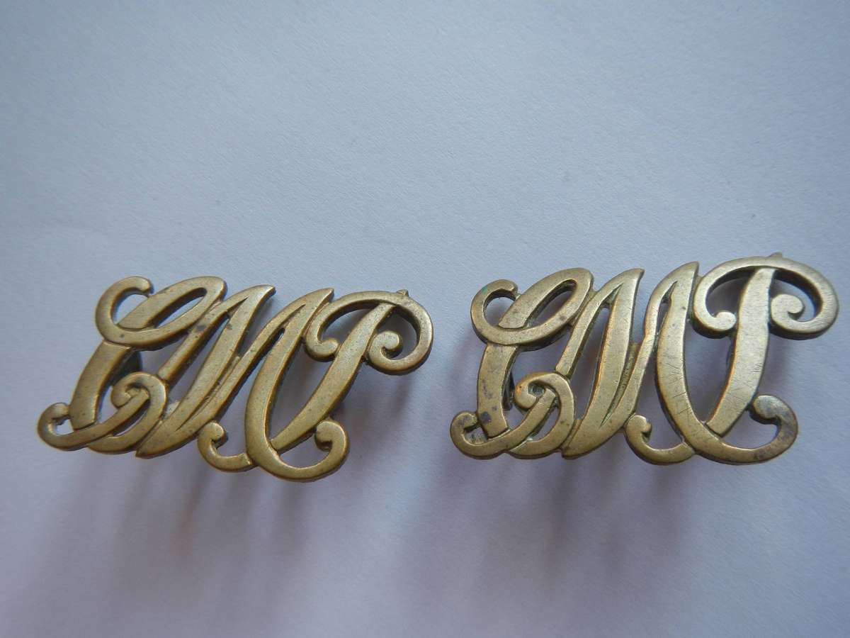 Cape Mounted Police pair collar badges