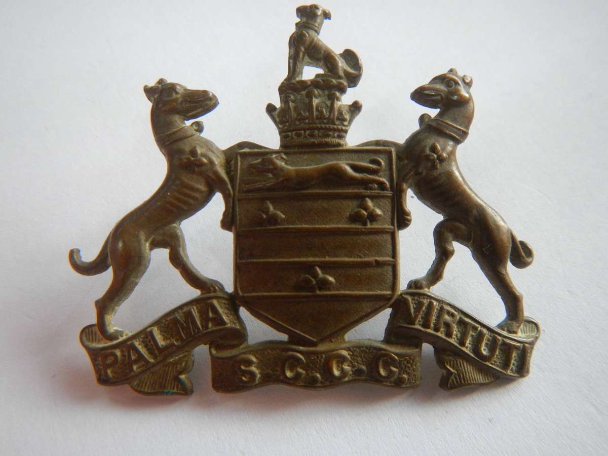 Selborne College Cadet Corps - cap badge has the lettering on bottom scroll - SCCC