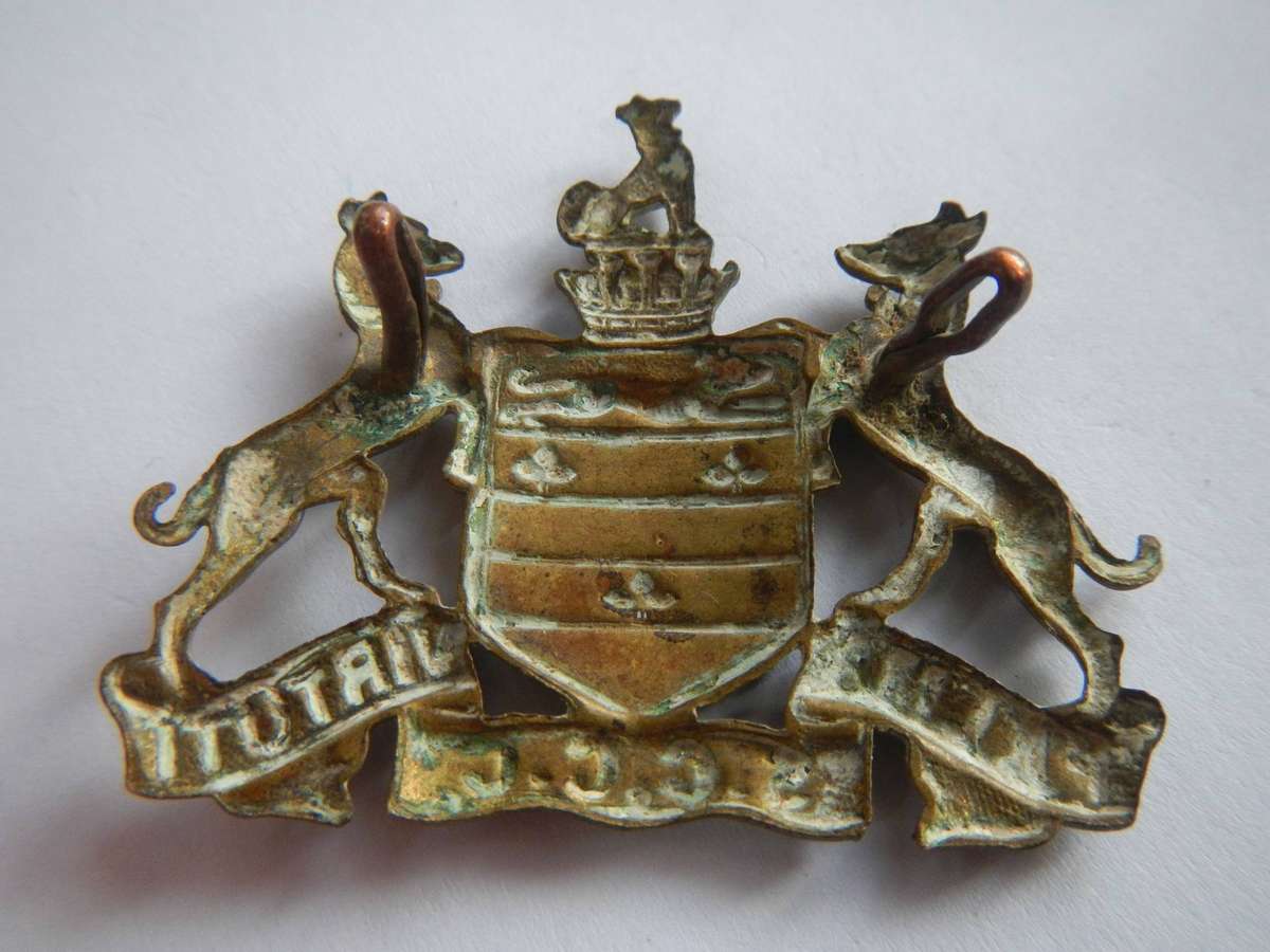 Selborne College Cadet Corps - cap badge has the lettering on bottom scroll - SCCC