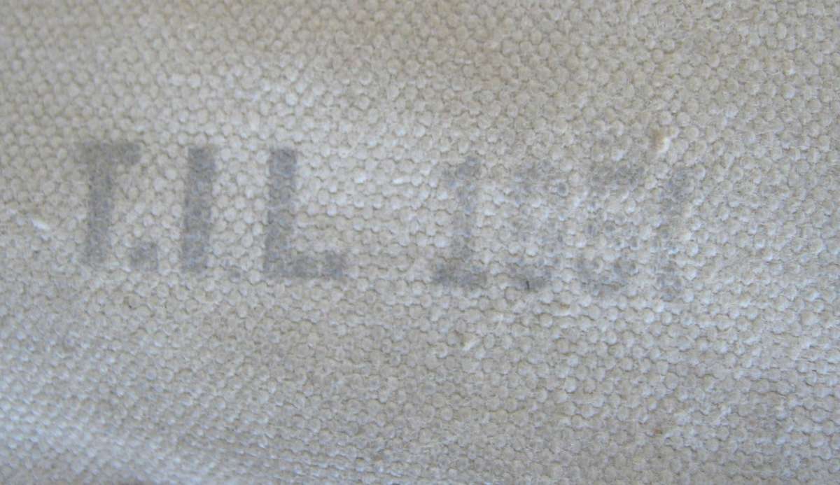 MILITARY CANVAS HOLSTER FOR A REVOLVER DATED 1951 AND PAINTED WHITE IN GOOD CONDITION