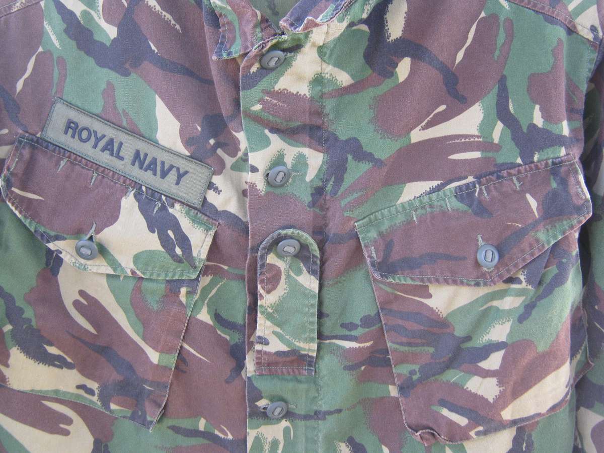 ROYAL NAVY WOODLAND PATTERN SHIRT XL WITH BUTTONS AND  ZIPS IN GOOD CONDITION DIMENSIONS BELOW