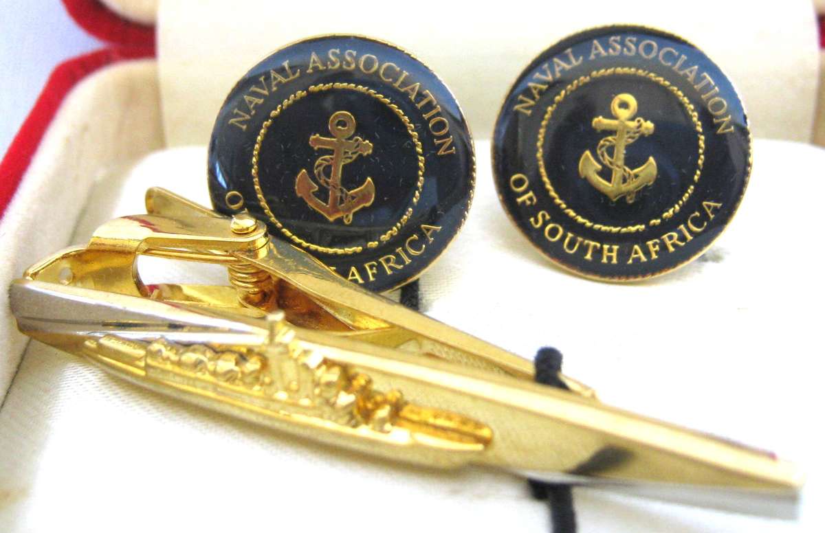 BOXED PAIR OF NAVAL ASSOCIATION CUFF LINKS WITH TIE PIN AND A PAIR OF N.E.B. CUFF LINKS ?