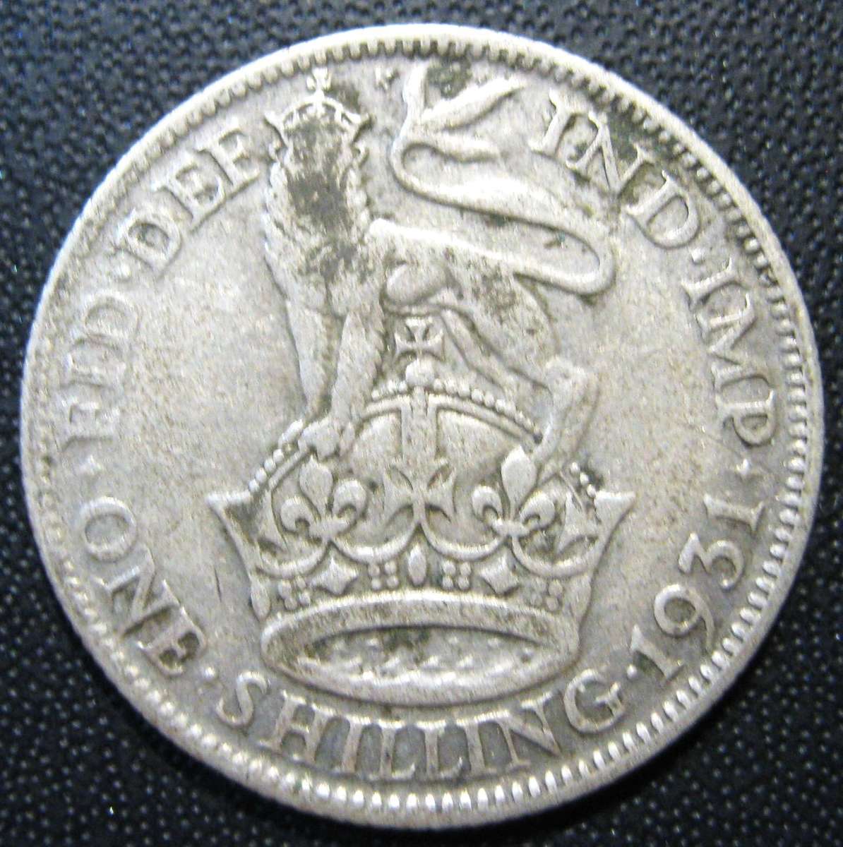 1931 BRITISH SILVER ONE SHILLING IN GOOD CIRCULATED CONDITION