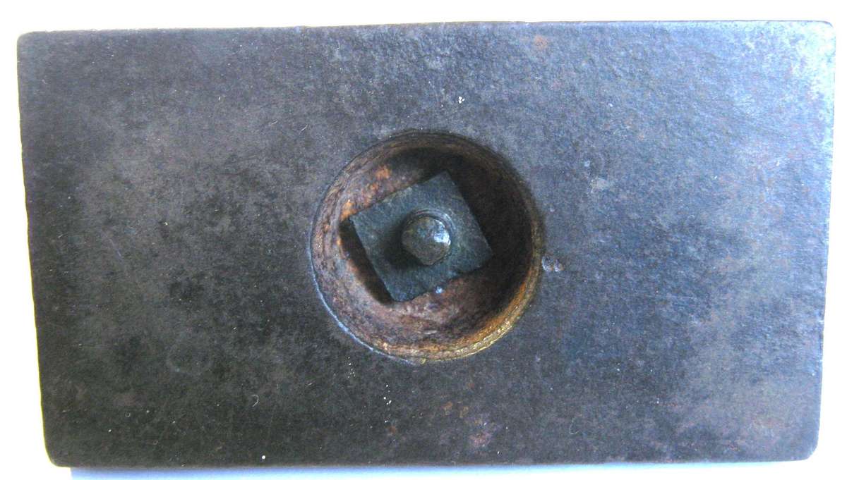 ANTIQUE CAST IRON PAPER WEIGHT 9 X 5 CM IN GOOD CONDITION