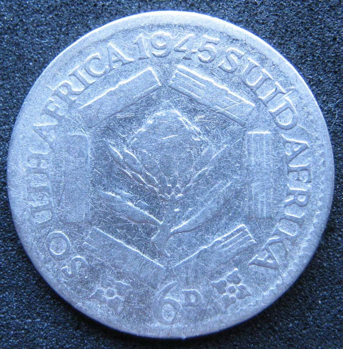 1945 S.A. SIXPENCE IN A  CIRCULATED CONDITION 3 GRAMS 80% SILVER