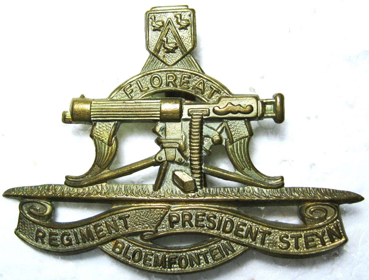 REGIMENT PRESIDENT STEYN BLOEMFONTEIN EARLY TYPE CAP BADGE WITH SLIDE