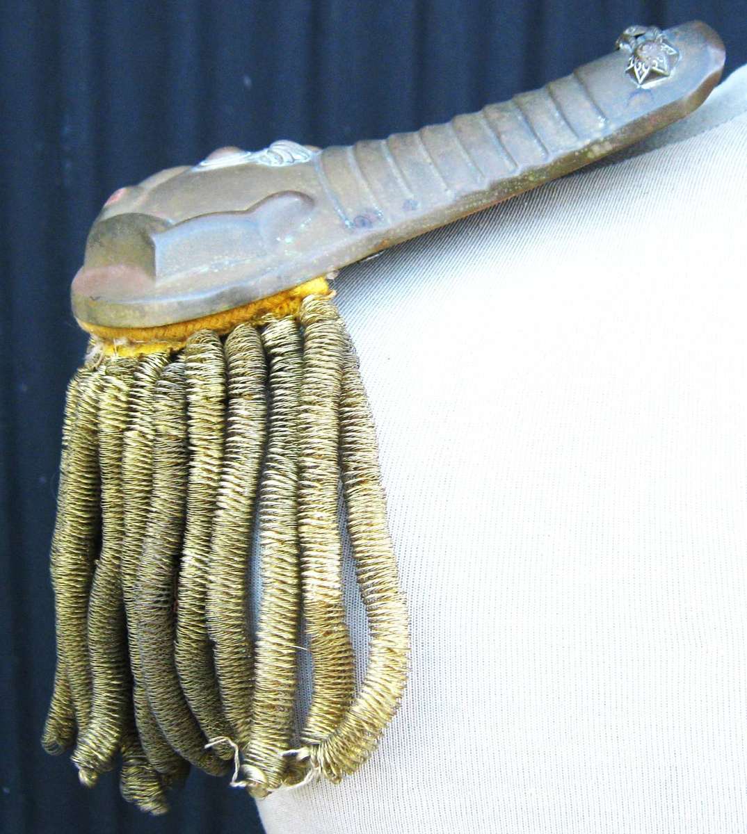 BRASS SHOULDER BOARD WITH TASSLES - CANNOT IDENTIFY IT BUT IN FAIR USED CONDITION