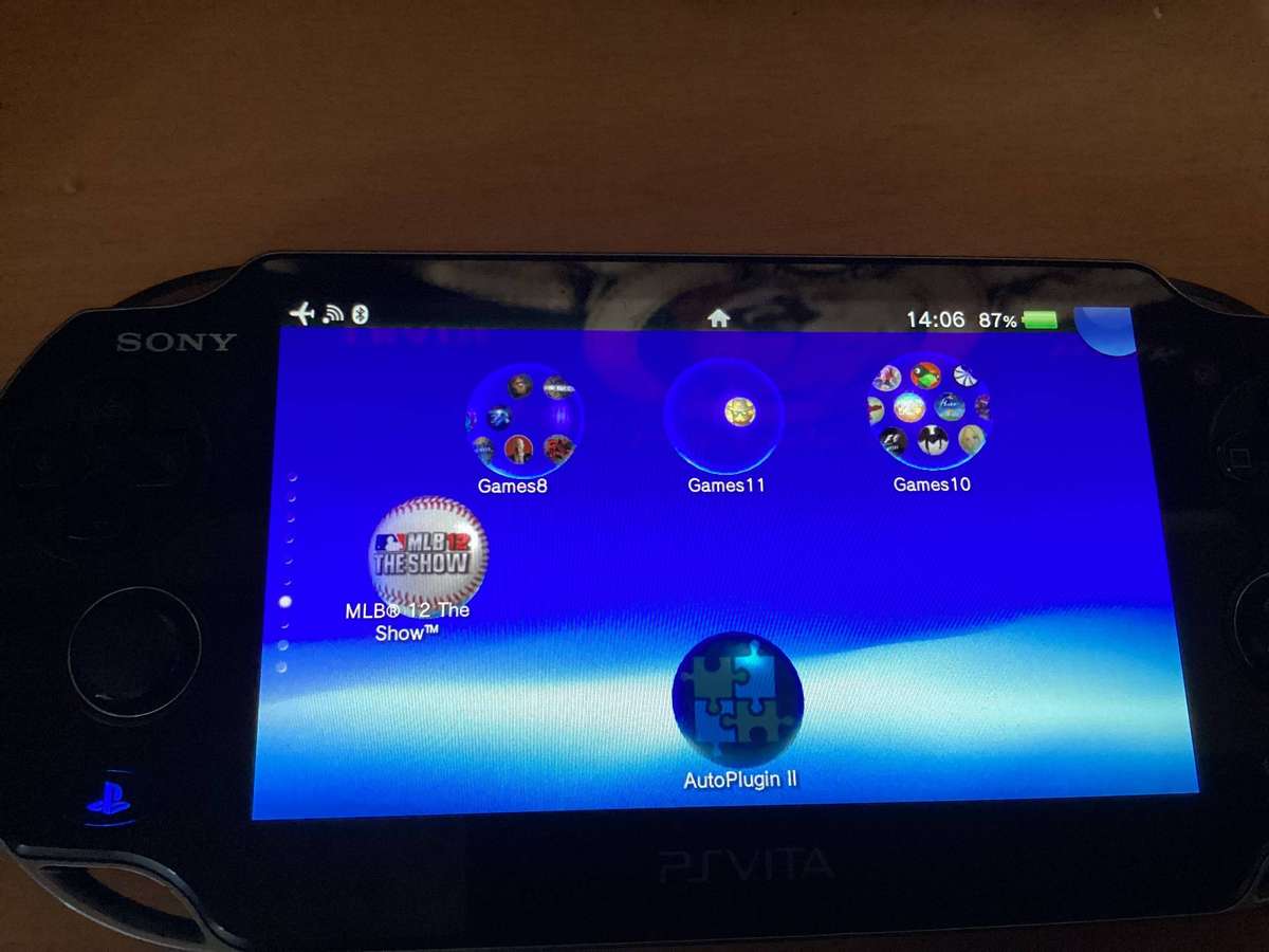 PSP Vita E0682 comes with a 240 gig memory card Modded with over 50games installed