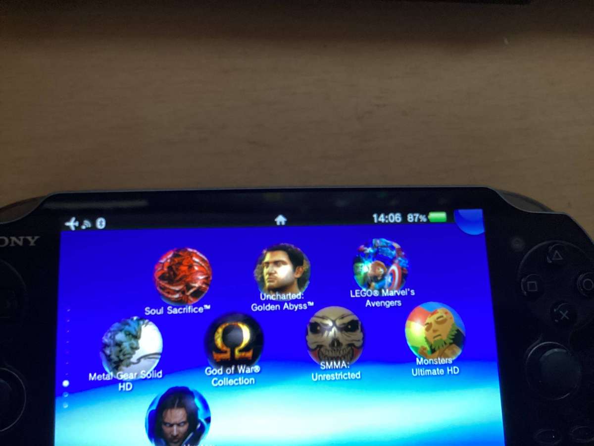 PSP Vita E0682 comes with a 240 gig memory card Modded with over 50games installed